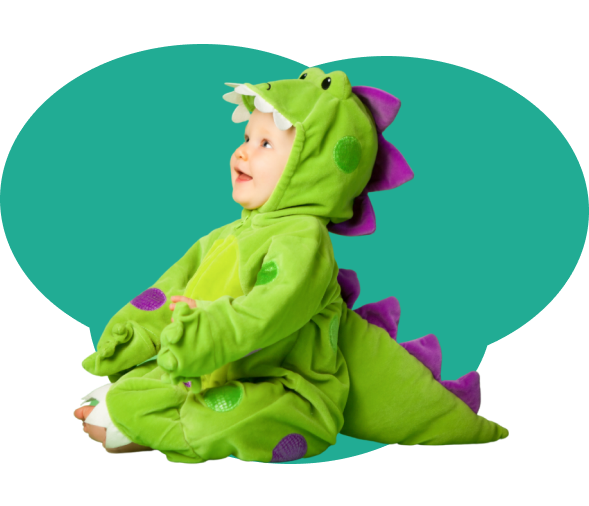 Bebê fantasiado de dinossauro.